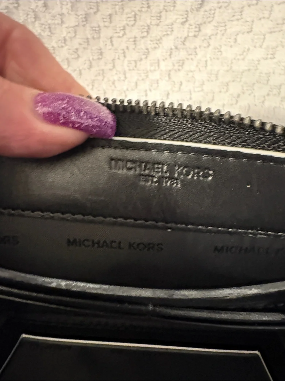 Wallet-The Michael Kors Men's Tech ZIP Around Black Leather wallet